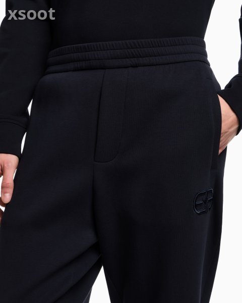 Double-jersey joggers with embossed embroidered EA logo