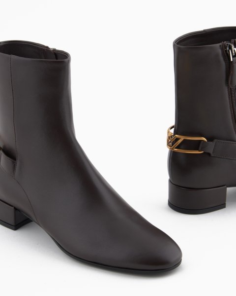 Nappa-leather ankle boots with an eagle plate